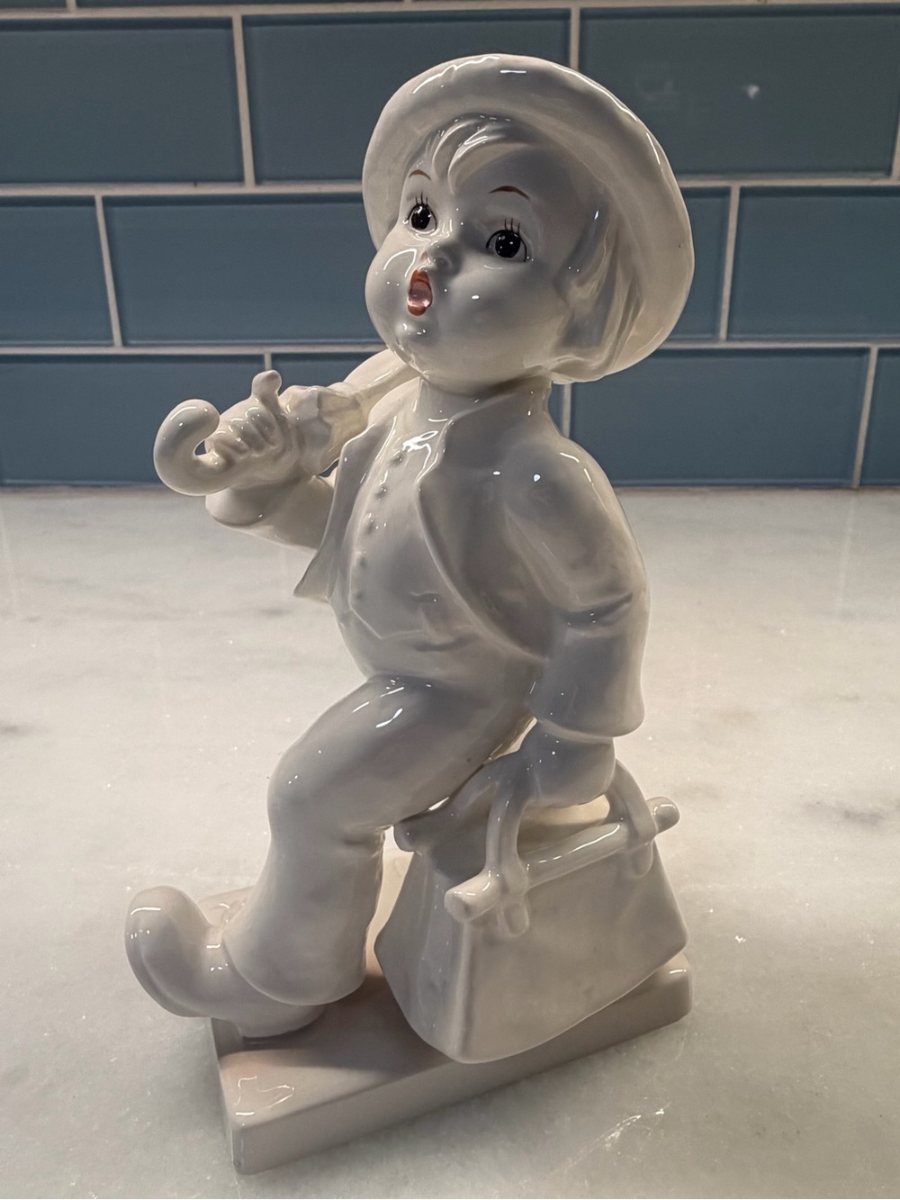 Goebel Glossy White Porcelain Boy Figurine with Subtle Pink Lips